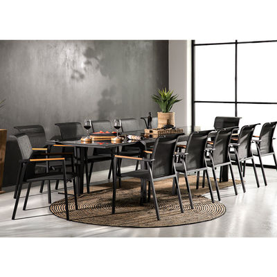 Mesa y silla de comedor para 12 invitados por AJUNION en el jardín