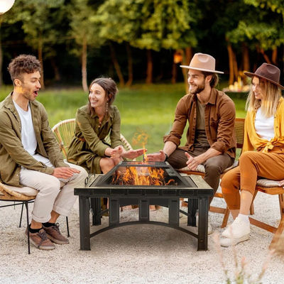 Huerto patio jardín hoguera hoguera de campamento con cubo de hielo y barbacoa de carbón