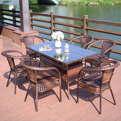 Balcón de jardín al aire libre Sillón apilable y mesa de comedor de mimbre para ocio