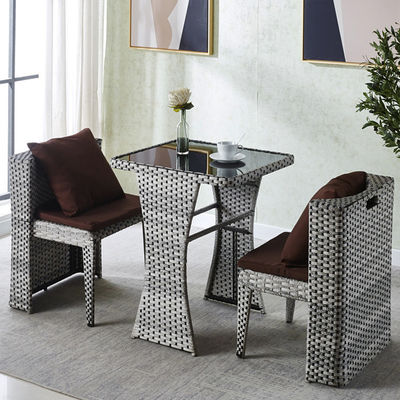 Muebles de rotín para exteriores para cafeterías Conjunto de mesa y silla de vidrio templado
