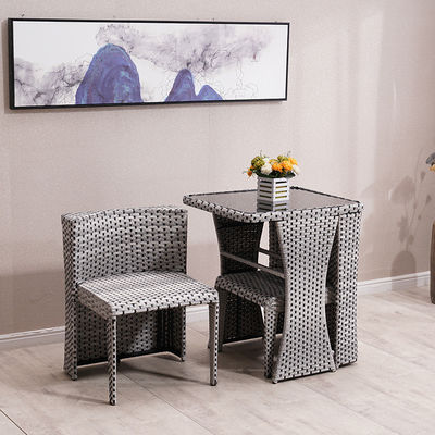 Muebles de rotín para exteriores para cafeterías Conjunto de mesa y silla de vidrio templado