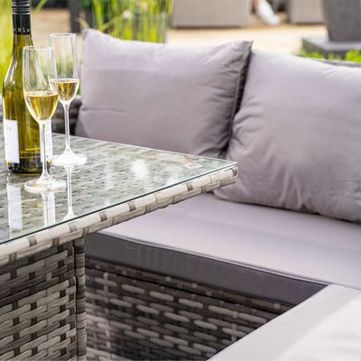 Añadir elegancia a su jardín con AJUNION Wicker tejido sofá conjunto y mesa de fuego