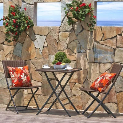 Muebles de patio al aire libre con mesa y silla plegables de vidrio de ratán de PE