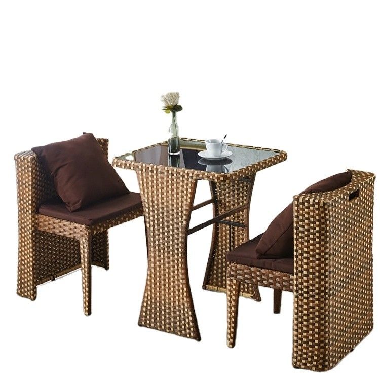 Muebles de rotín para exteriores para cafeterías Conjunto de mesa y silla de vidrio templado