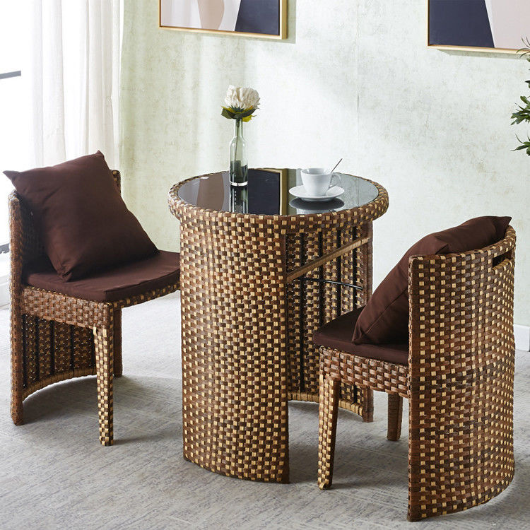 Mesa de comedor y silla redonda de vidrio templado de ratán para cafetería de diseño moderno